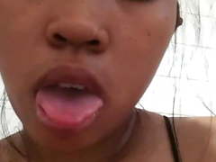 Thai girl masturbating cucumber