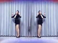 Sexy Asian woman in high heels dancing