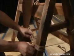 Wooden bondage and tit torture of japanese slave girl